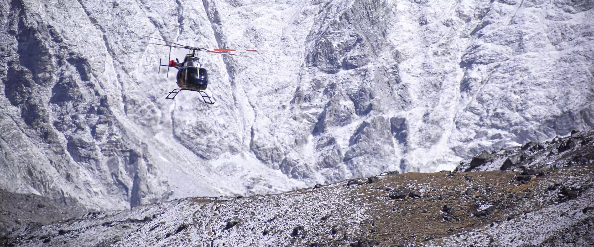 Helicopter flying in everest region during helicopter tour