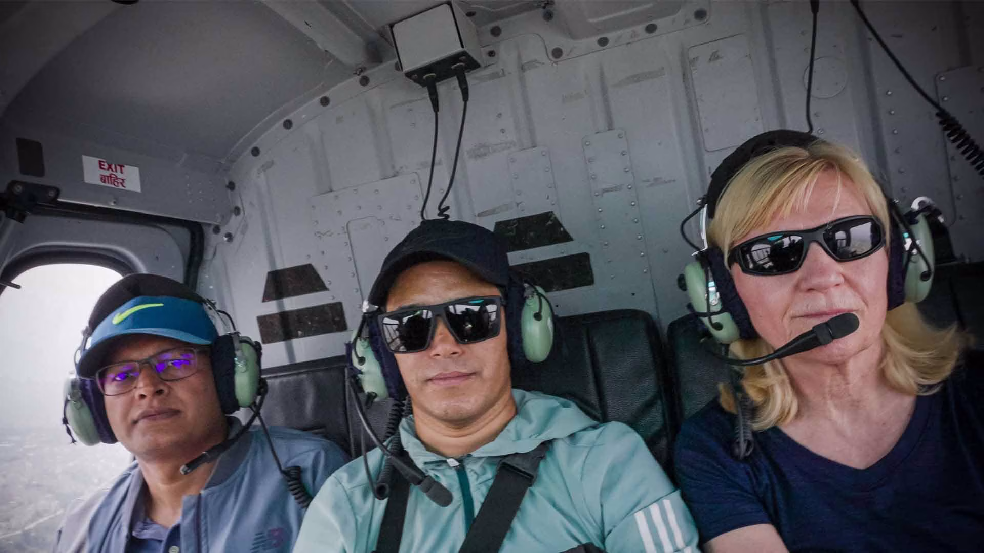 Travellers inside a helicopter enjoying an Everest Base Camp Helicopter Tour