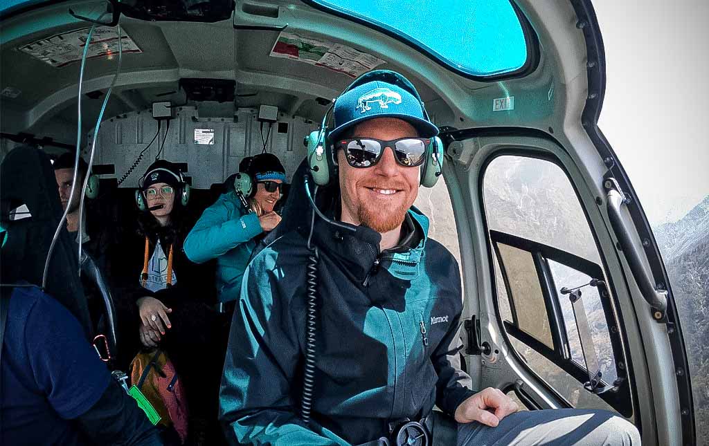 Passenger at front seat in Everest Base Camp Helicopter tour
