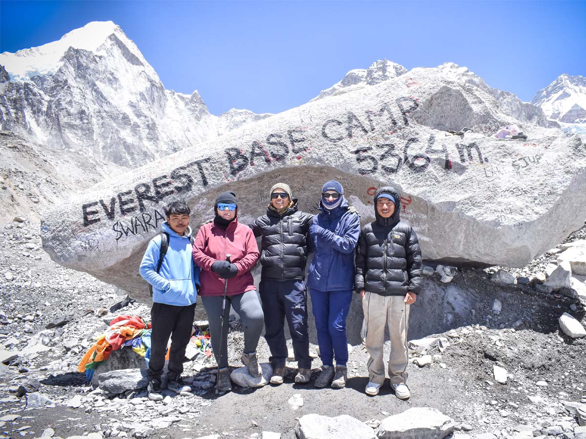 Guide Porter and Guest at Everest Base Camp 5364 Meter
