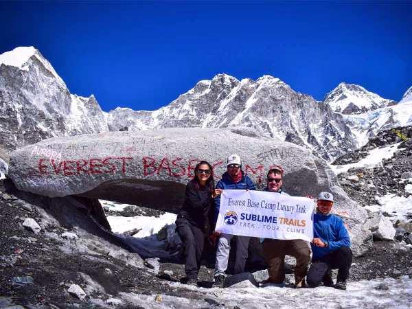 Client With Banner Of Luxury Everest Base Camp Trek Sublime Trails 1