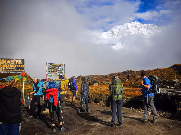 Guests Enjoying Cloudy Mountain View From Abc