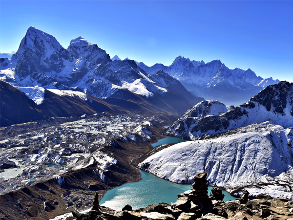The unforgettable Gokyo Ri viewpoint overlooking the Gokyo Lakes and the Everest Himalayas.