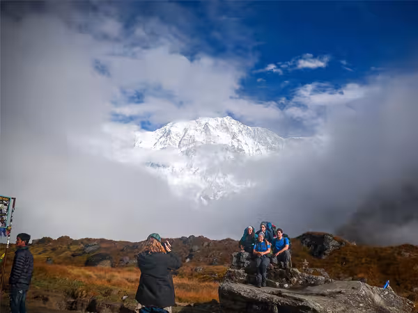 Sublime Trails Guest Capturing photo infront of mountain in Annapurna Base Camp Trek